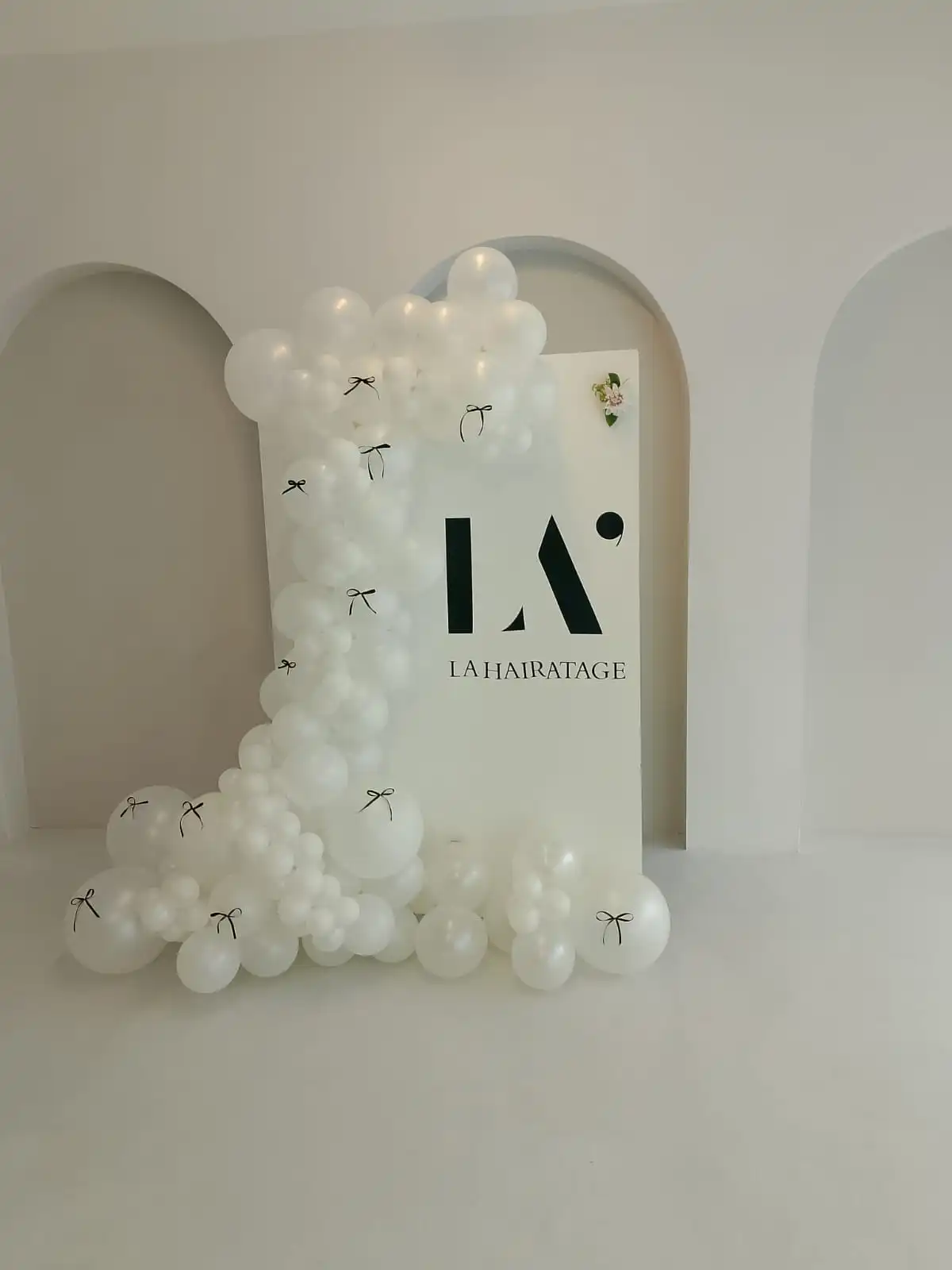 Professional event styling with Instagram-worthy decor and balloon installation